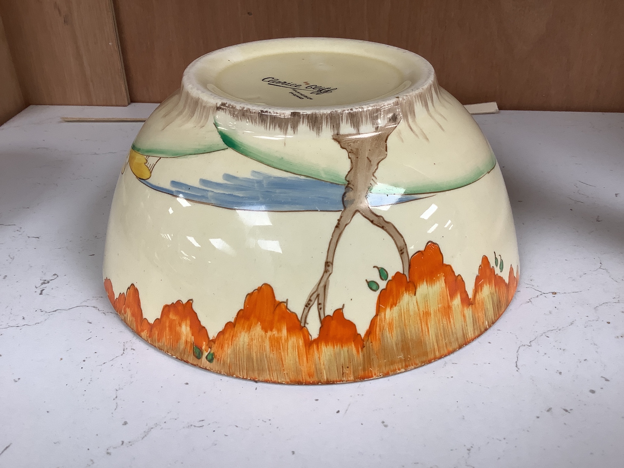 A Clarice Cliff landscape bowl, height 8cm diameter 18cm
